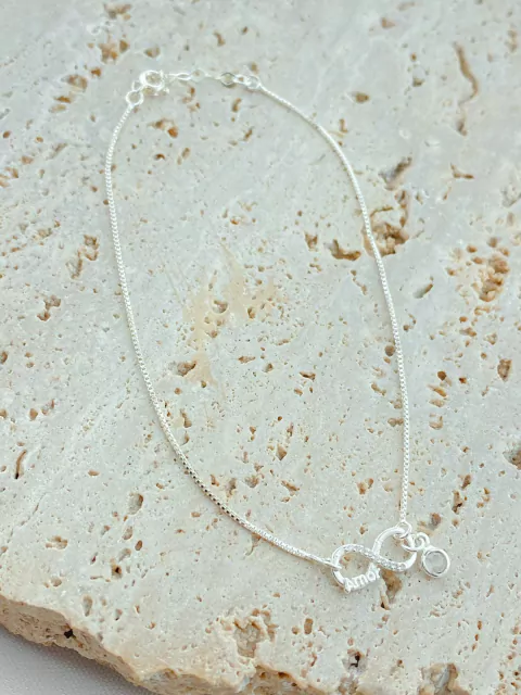 TORNOZELEIRA SÍMBOLO INFINITO SEMI CRAVEJADO PRATA 925