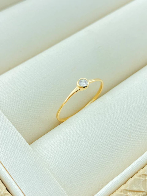 ANEL PONTO DE LUZ FOLHADO A OURO