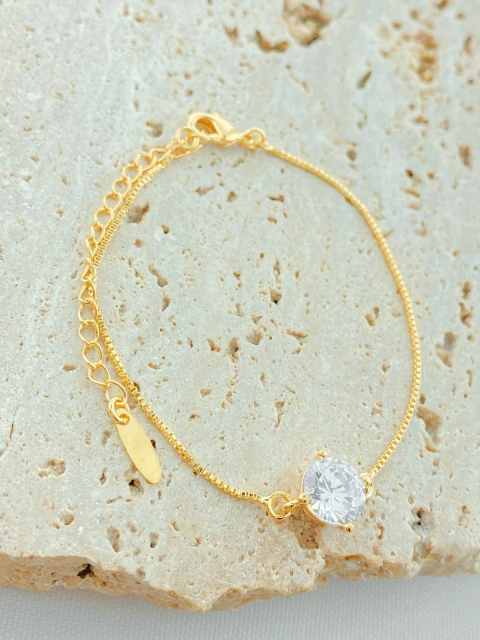 PULSEIRA PONTO DE LUZ NO CENTRO FOLHADO A OURO