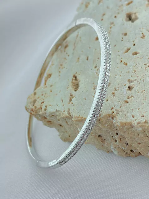 BRACELETE COM MINIZIRCÔNIAS CRAVEJADAS-RÓDIO BRANCO