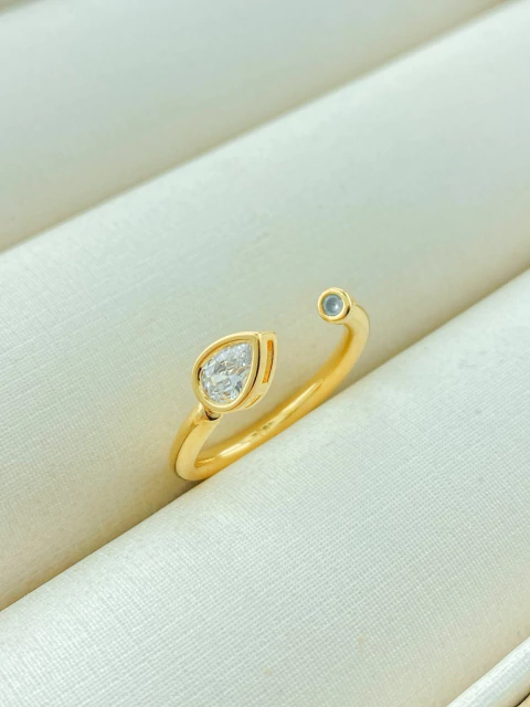 ANEL REGULAGEM PONTA GOTA CRISTAL FOLHADO A OURO