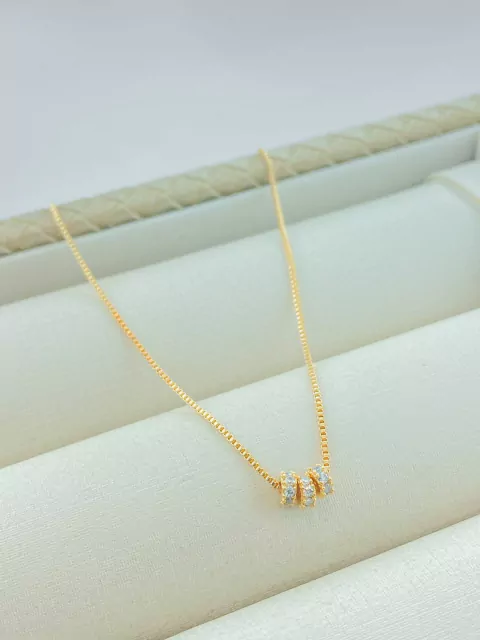 COLAR MINI ENGRENAGENS CRAVEJADAS BANHADO A OURO 18K