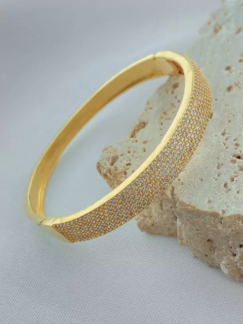 BRACELETE RIGIDO 10 mm CRAVEJADO MICROZIRCONIAS FOLHADO A OURO