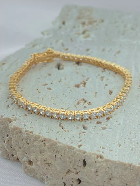 PULSEIRA RIVIERA BRANCA FOLHADA A OURO