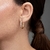 Brinco de Argola Articulada Média com Zircônias Coloridas Folheado a Ouro 18k - comprar online