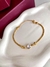 PU91319 - PULSEIRA LAMINADA DETALHADA COM PONTO DE LUZ - FOLHEADO A OURO na internet