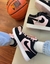 Imagem do Jordan preto/rose camurça