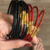 Pulsera red and gold en internet