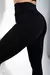 calza negra con  recortes para mujer . Idel para el gimnasio . costuras reforzadas y calce perfecto  