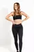 calza deportiva lisa negra  para mujer con detalles sutiles en estampa negra . ideal para el gimnasio