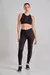 Calza deportiva para mujer, color negra lisa con detalles en micro tul. Diseño original y moderno, perfecta para el uso diario. Comodidad y estilo en una sola prenda, ideal para tu rutina de ejercicios o para un look casual.