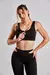 Calza deportiva lisa con cortes laterales en la cintura para mujer en color negro. ideal para el gimnasio .