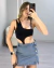Imagem do SHORT SAIA JEANS CÓS ALTO LAVAGEM CLARA BOTÕES FRONTAIS
