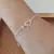 Pulseira dois corações vazados prata 925 - comprar online