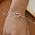 Pulseira coração vazado borda cravejada prata 925 - comprar online