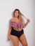 MALLA TOP VOLADO ESTAMPADO CON TIRAS CRUZADAS EN BUSTO Y VEDETINA TIRO ALTO CON FAJA - comprar online