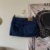 mini saia jeans escura - comprar online