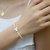 Pulseira infantil perola e ouro amarelo 18k Espirito Santo - comprar online