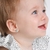Brinco infantil ouro amarelo 18k Flor Turquesa - comprar online