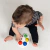 Brinquedo sensorial Paleta de Cores Baby Einstein com botões coloridos vermelho, amarelo, azul e verde em formato de paleta de pintura para bebês a partir de 6 meses