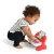 Piano infantil de madeira colorido com teclas multicoloridas e suporte para partituras com ilustração animada da Marca Hape. Piano Magic Touch.