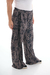Pantalón jogger, tiras laterales.Full print en internet