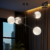 LAMPARA ARAÑA ATENAS CLEO 4 LUCES BOCHA 15CM VIDRIO SATINADO LED E27 en internet