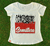 Camiseta com estampa de time de mulheres do EZLN, simbolizando força e resistência, com a palavra "Semillero" (Sementeira) destacada.