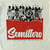 Camiseta com estampa de time de mulheres do EZLN, simbolizando força e resistência, com a palavra "Semillero" (Sementeira) destacada.