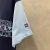 Camiseta Quiksilver manga trocada azul na internet