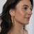 BRINCO MAXI FRANJA OURO 18K
