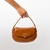 BOLSA TIRACOLO COM PINGENTE ORGÂNICO - comprar online