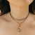 COLAR EM COURO MARROM COM INICIAL na internet