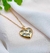 Conjunto coração com zircônias dourado na internet