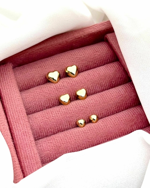 Trio de corações cheios dourado