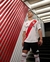 Imagen de 3X1 CAMISETA TITULAR 2025 RIVER + CAMISETA ALTERNATIVA + AURICULARES AES PRO MAX