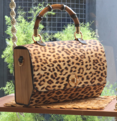 Bolsa Couro Madeira Suécia onça na internet