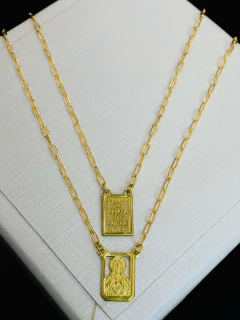 Escapulário em moeda antiga faça pagamento e mande print qual modelo vc deseja