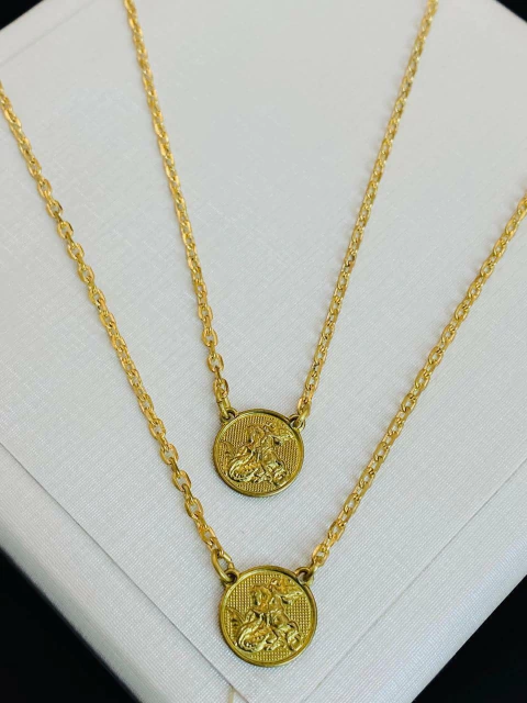 Escapulário em moeda antiga faça pagamento e mande print qual modelo vc deseja