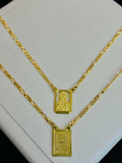 Escapulário em moeda antiga faça pagamento e mande print qual modelo vc deseja na internet