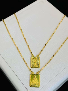 Escapulário em moeda antiga faça pagamento e mande print qual modelo vc deseja - comprar online