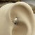 Piercing Torção Pena - comprar online