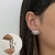 Brinco Ear Hook Zircônias Tay - comprar online