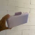 Clutch Stella Lilás na internet