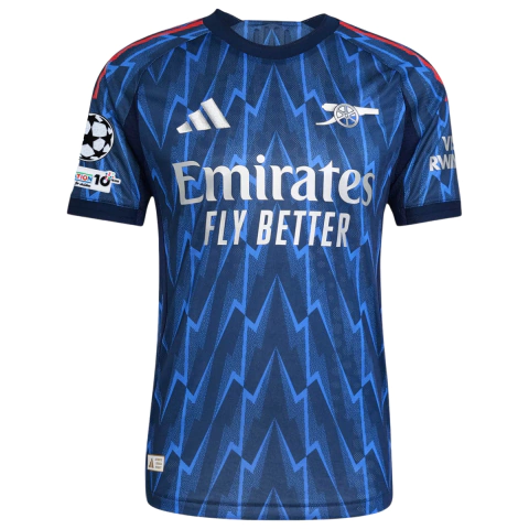 camisa arsenal 25/26 champions league azul, camisa alternativa arsenal com patch ucl 2025, camisa arsenal azul marinho patch champions, camisa arsenal torcedor champions league 25/26, camisa adidas arsenal azul com patch oficial ucl, camisa arsenal raio r