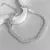 PULSERA GRUMET TWO