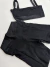 Conjunto fitness de short com bolso e top reto micro canelado poliamida preto - comprar online