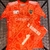 Camiseta Boca Chiquito Romero Betsson naranja