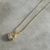 Colar ponto de luz G banhado a ouro18k na internet