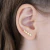 BRINCO EARCUFF DE ESTRELAS BANHADO EM OURO - comprar online